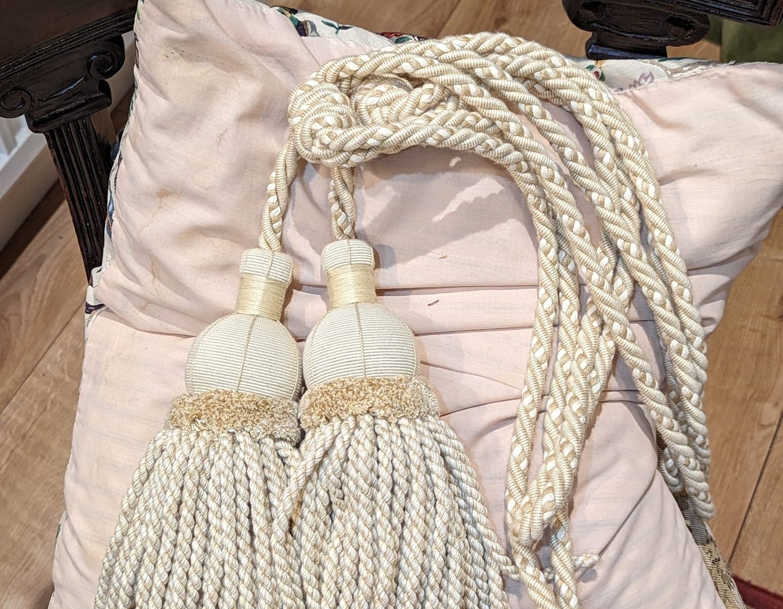 Light cream rope & tassel tiebacks with velvet detailing