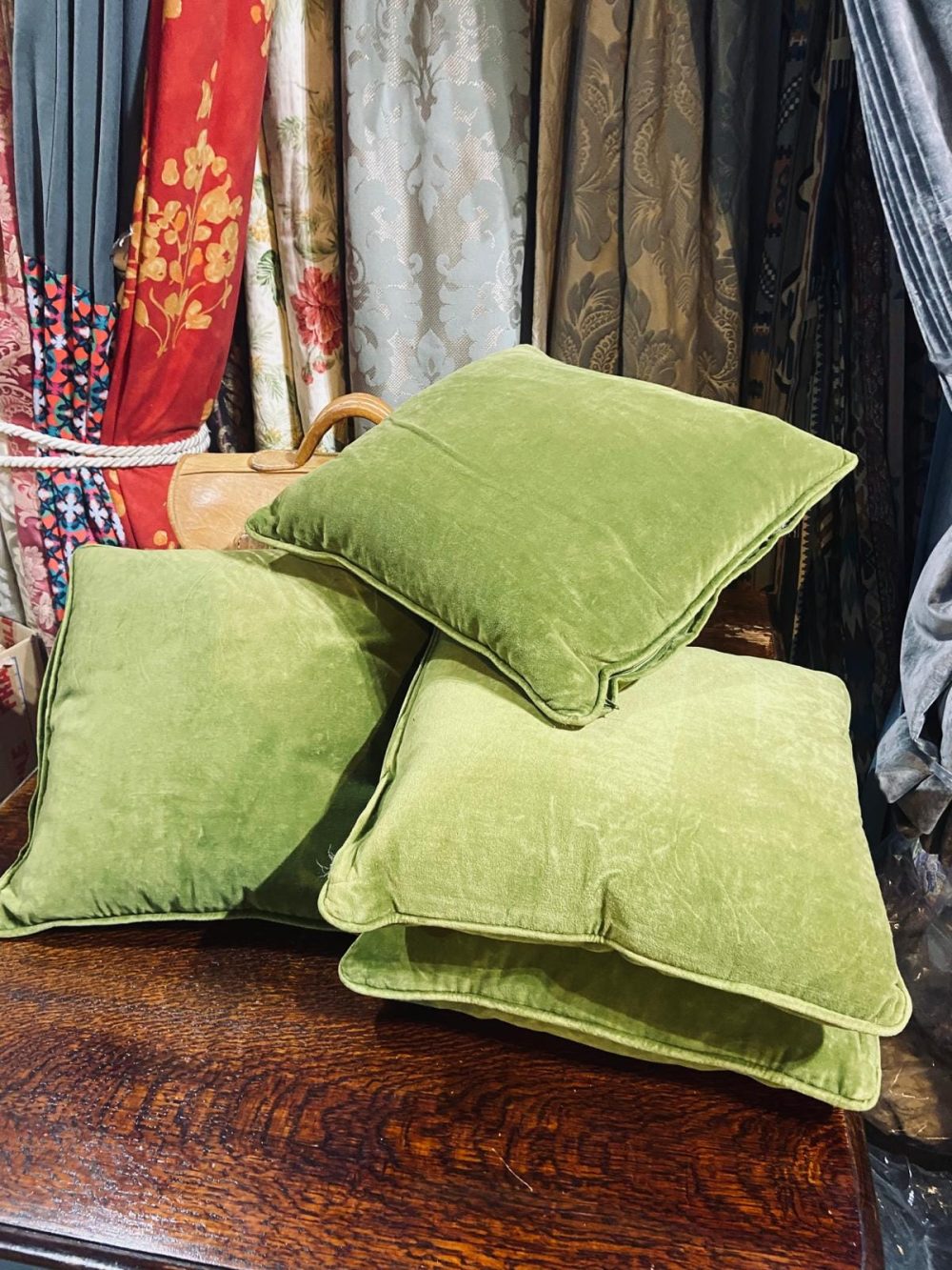 Four Feather Filled Green Velvet Cushions