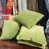 Four Feather Filled Green Velvet Cushions