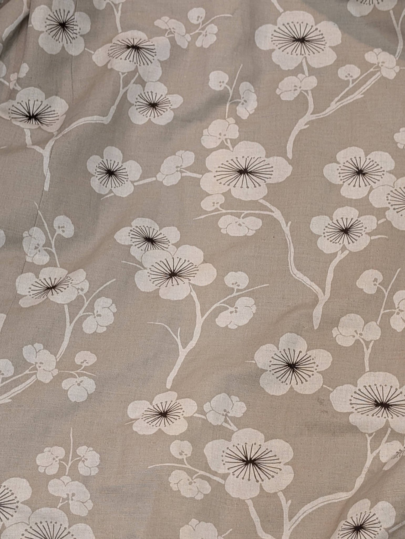 rach36 - Divinely Vintage Interiors Beige fabric with a white cherry blossom pattern and winding branches.