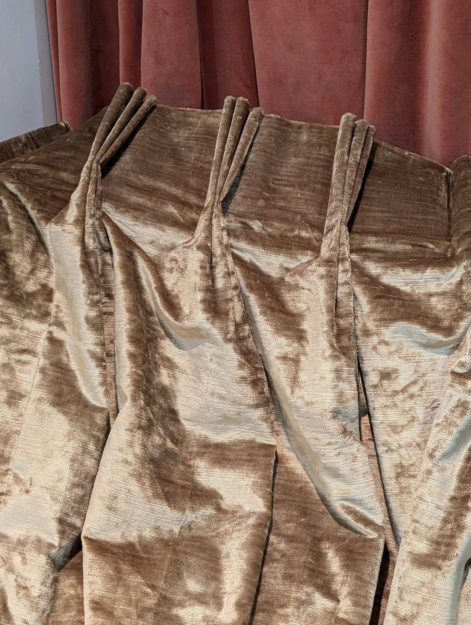 judith5 - Divinely Vintage Interiors Close-up of brown velvet curtains with gathered folds and soft sheen.