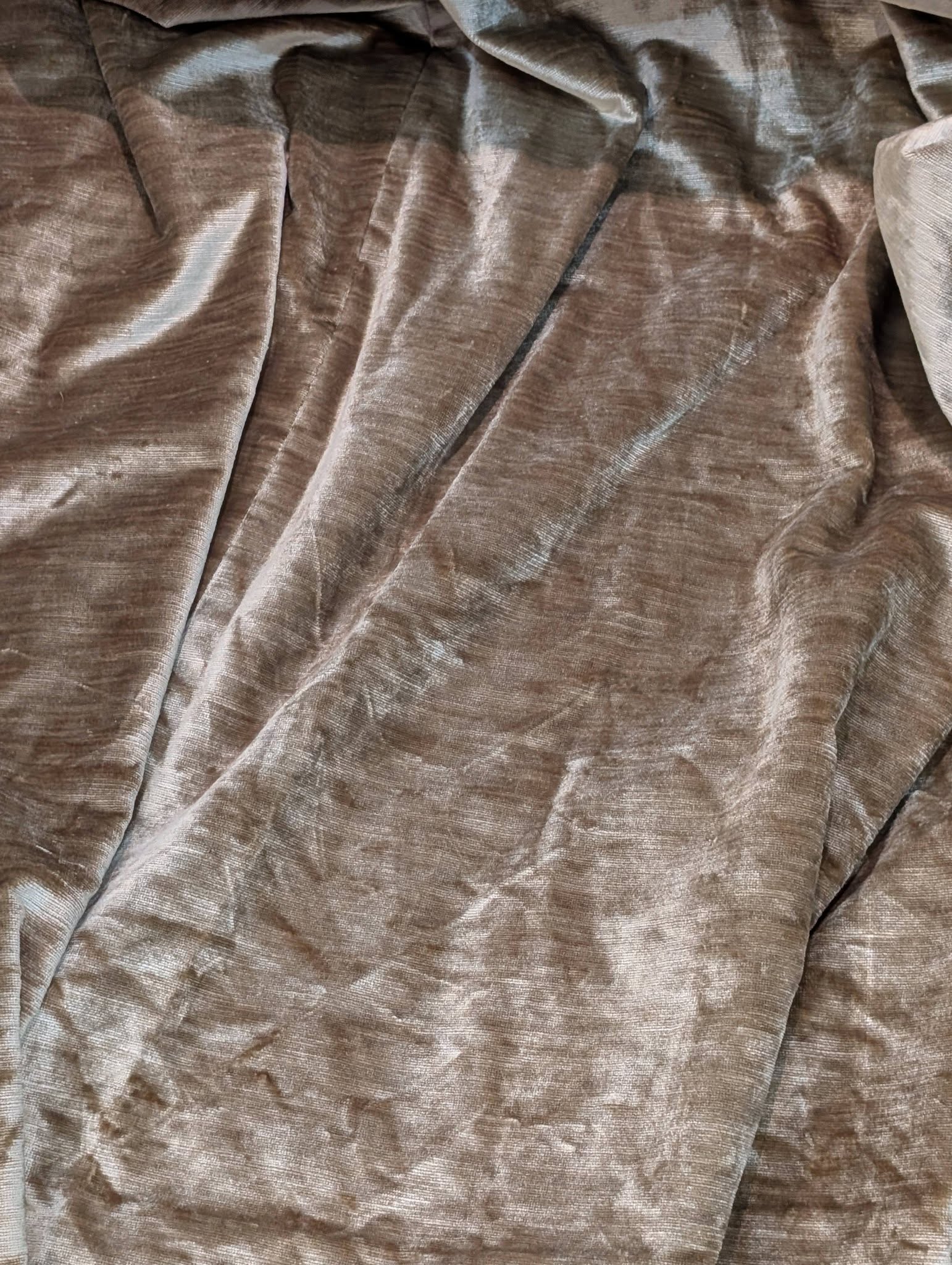 judith9 - Divinely Vintage Interiors Close-up of brown crushed-velvet fabric with soft folds and highlights