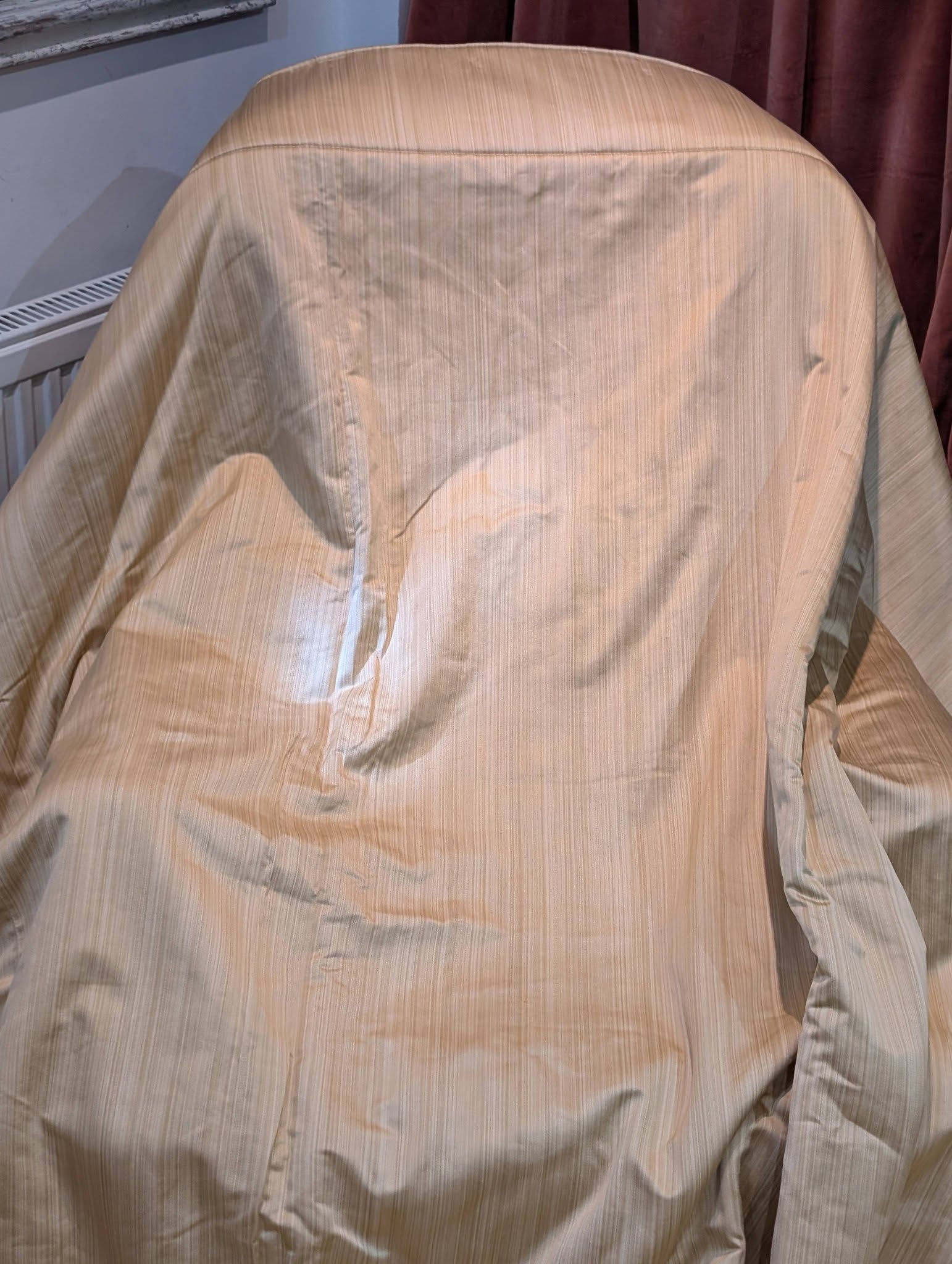 single3 - Divinely Vintage Interiors Chair covered with light beige striped fabric in a room.
